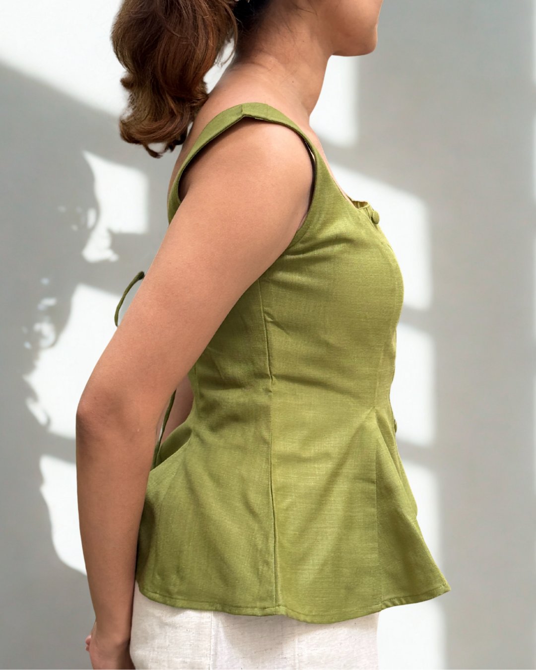 Bellini Peplum Top in Green
