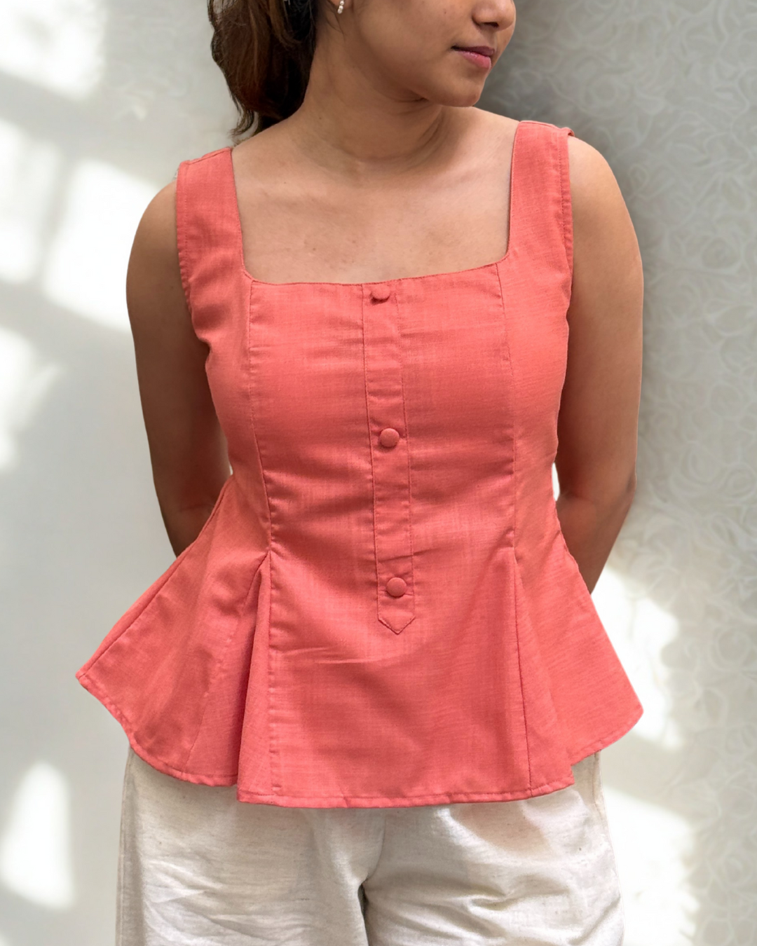 Bellini Peplum Top in Coral