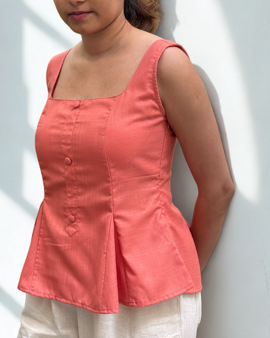Bellini Peplum Top in Coral