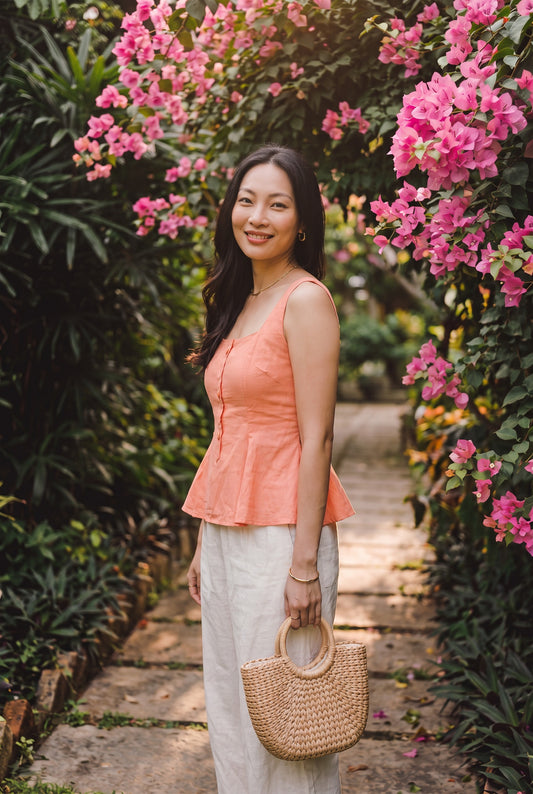 Bellini Peplum Top in Peach