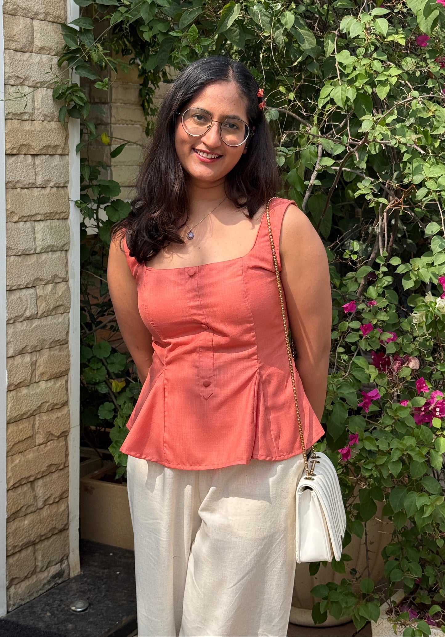 Bellini Peplum Top in Coral